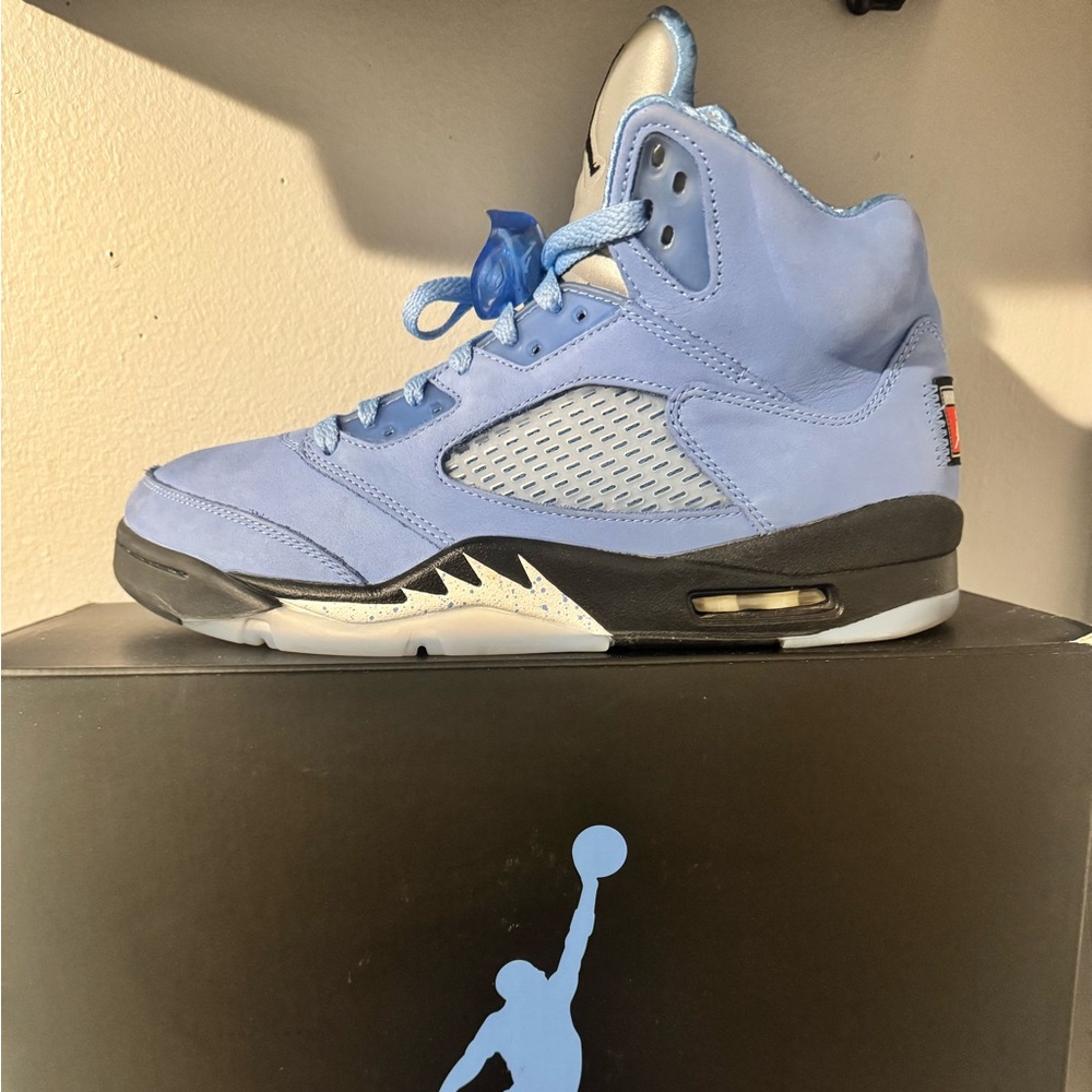University blue and white Jordan 5s